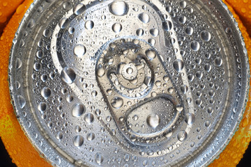 Cold drink in aluminium can with water condensation
