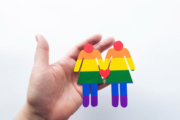 multi-colored girls in hand, lgbt symbol
