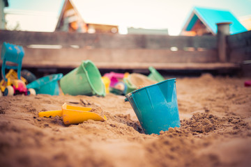 Childhood sandbox concept: Close up of plastic toy bucket