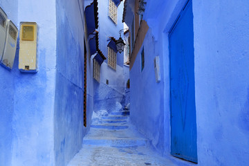 View of the blue walls of Medina quarter in Chefchaouen, Morocco. The city, also known as Chaouen is noted for its buildings in shades of blue and that makes Chefchaouen very attractive to visitors.