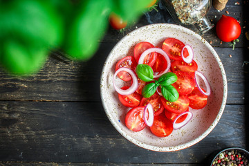 tomato and basil salad Menu concept healthy eating. food background top view copy space for text healthy eating table setting keto or paleo diet organic