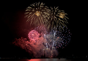 Bright fireworks in the night sky. Celebration moment