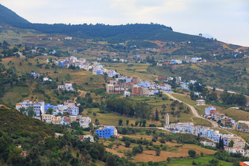 View of the suburbs of Chefchaouen, Morocco. The city, also known as Chaouen is noted for its buildings in shades of blue and that makes Chefchaouen very attractive to visitors.