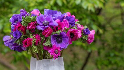 Pink, Purple & Red Cut-flower bouquet in vase.