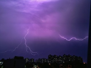 Naklejka na ściany i meble lightning over the city