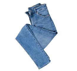 Jeans isolated on white, denim pants isolated, folded blue jeans isolated on white, summer clothes, cloth element mock up - obrazy, fototapety, plakaty