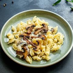 pasta creste di galla sauce with mushrooms and cream Menu concept healthy eating. food background top view copy space