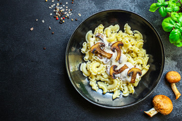 pasta creste di galla sauce with mushrooms and cream Menu concept healthy eating. food background top view copy space