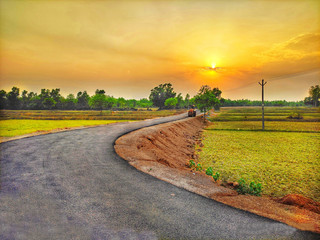 Naklejka premium Evening view of village road.