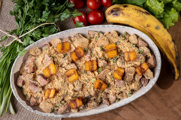 Brazilian banana farofa. Made from manioc flour, bacon, banana and sausage.