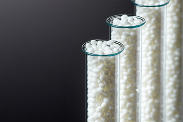 Closeup of a granule of white plastic polymer