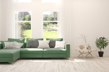 White living room with sofa and summer landscape in window. Scandinavian interior design. 3D illustration
