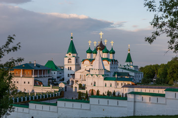 Fototapeta na wymiar Nizhny Novgorod. Assumption Church, Ascension Cathedral and Ascension Monastery against the backdrop of a beautiful sky at sunset