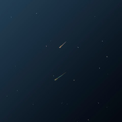 Obraz na płótnie Canvas A starry night sky. Two meteorites fly against the background of stars.