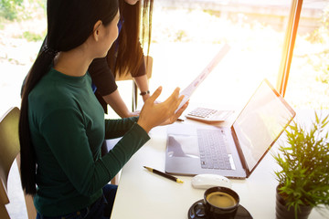 team Business analysts make decisions about the US economy that affect future operations of the company.concept