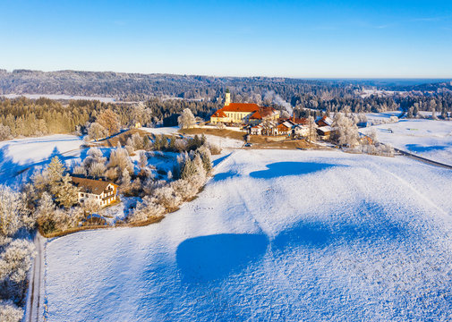 Germany, Bavaria, Sachsenkam, Drone view of Kloster Reutberg in winter