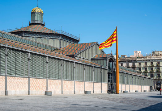 Barcelona, Spain - July 24, 2015. The principal facade of El Born market or Mercat del Born, chaired by the flag of Catalunya.