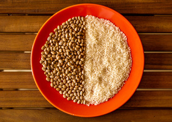 raw white rice and black beans - brazilian food