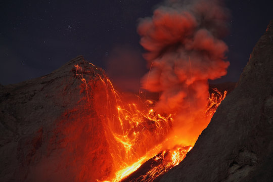 Indonesia, View of lava erupting from Batu Tara volcano island