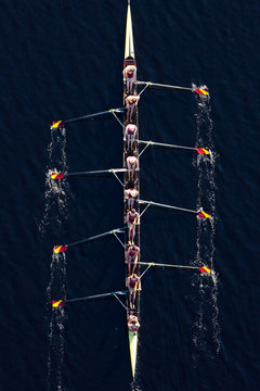 Elevated view of rowing eight in water