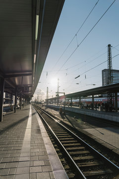 Germany, Hesse, Frankfurt, Train station at sunset