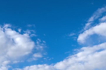 white clouds on a blue sky in summer