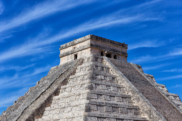 Mayan pyramid of Kukulcan against blue sky at Chichen Itza, Mexico