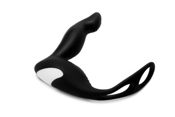 Black silicone prostate massager on white background. Anal plug.