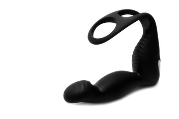 Black silicone prostate massager on white background. Anal plug.
