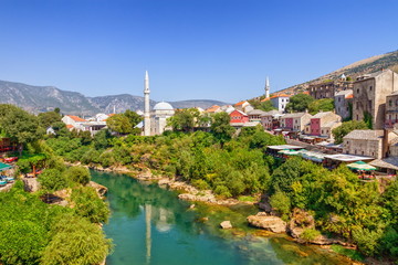 Fototapeta na wymiar View of old city of Mostar and Neretvy river by day, Bosnia and Herzegovina