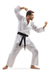 Man in kimono practicing martial art sport