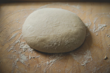 Fototapeta na wymiar bread dough on pastry board