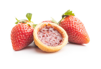 Sweet biscuits with strawberries jam and strawberries