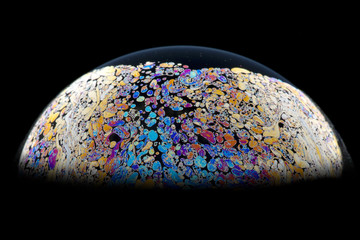 Soap bubble. Beautiful patterns. Macro photo.