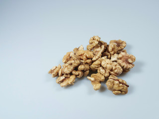 Fototapeta na wymiar handful of walnuts lying on the table