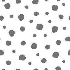 Vector seamless polka dots pattern in a chaotic manner. Hand drawn, doodle style. Design for fabric, wrapping, wallpaper, textile