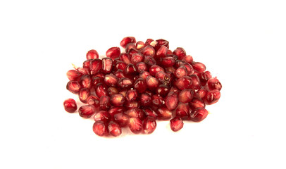 Juicy pomegranate fruit seeds Isolated on a white.