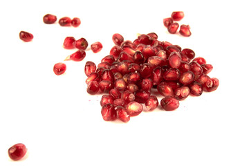 Juicy pomegranate fruit seeds Isolated on a white background. Seeds pomegranate