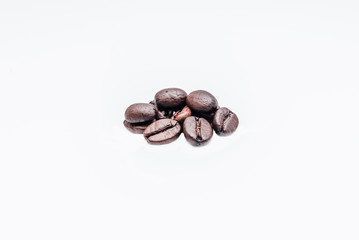 Coffee beans on a green background