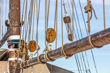 Pulleys, ropes, and mast of an old sailing yacht