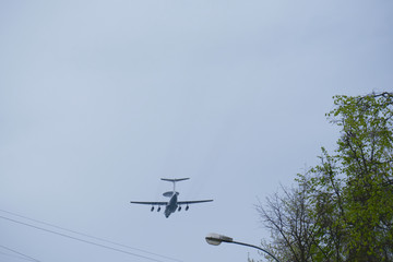 Russian military aircraft flies over the city