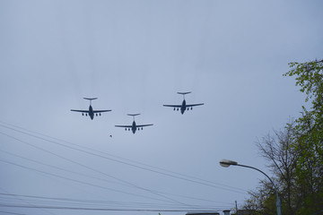 Russian military aircraft flies over the city