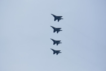 Russian military aircraft flies over the city