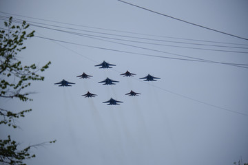 Russian military aircraft flies over the city