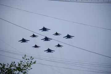 Russian military aircraft flies over the city