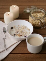 bowl with oatmeal and cappuccino