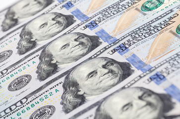 Background of 100 dollar bills. A pile of one hundred US dollars - Banknotes. Cash of hundred dollar bills, dollar background with high resolution