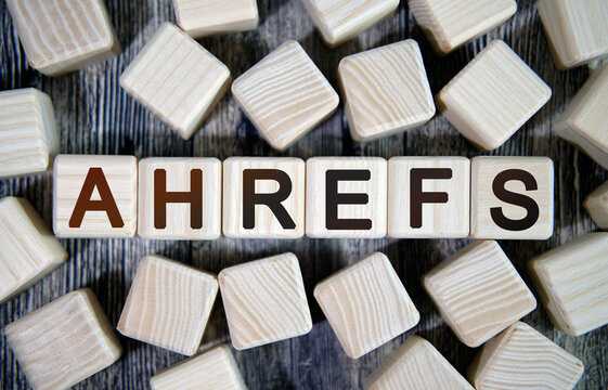Ahrefs - text concept seo on a wooden background surrounded by cubes