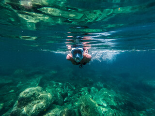 scuba diver in the sea snorkeling in st. kitts 