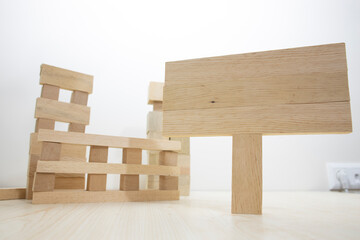 Building with wooden parts. Close-up on white background. Studio